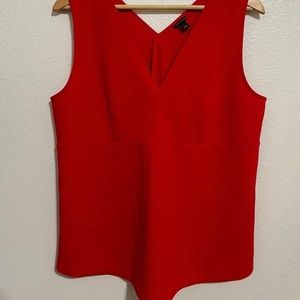 Red sleeveless blouse